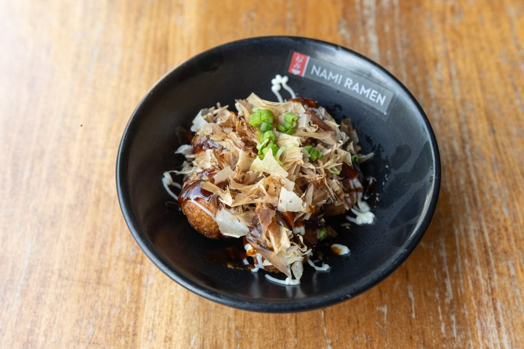 Takoyaki: fried batter with octopus filling.