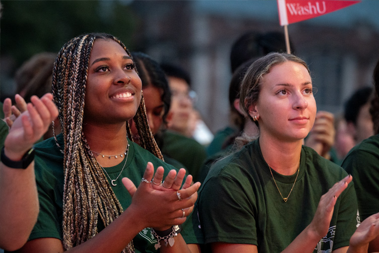 Group of students clapping during Convocation