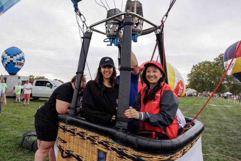 Student and Dr. G in hot air balloon on ground