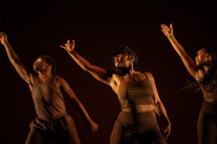 Students performing on stage during Black Anthology event