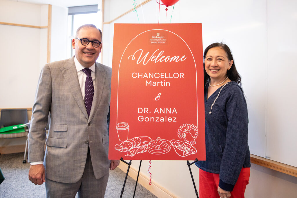 Chancellor Martin and Vice Chancellor Gonzalez pose with a sign welcoming them by name