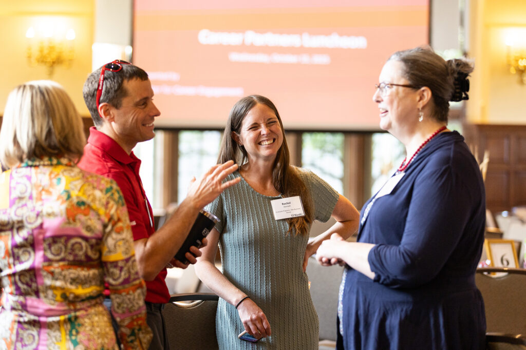 People have a conversation in a small group